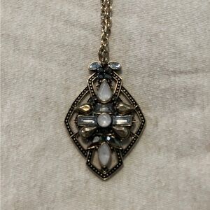 Vintage rhinestone/mother of pearl pendant necklace.